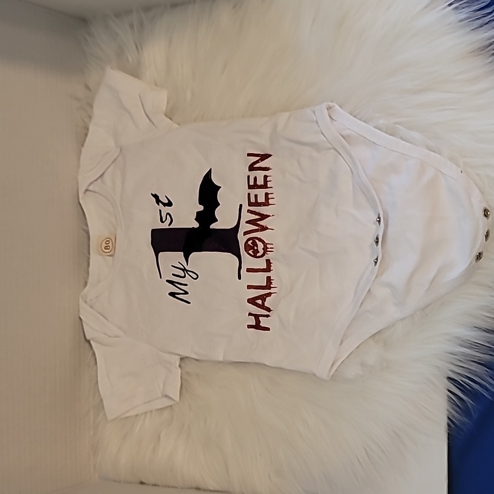 😍 My 1st Halloween onesie white with purple and orange letters.